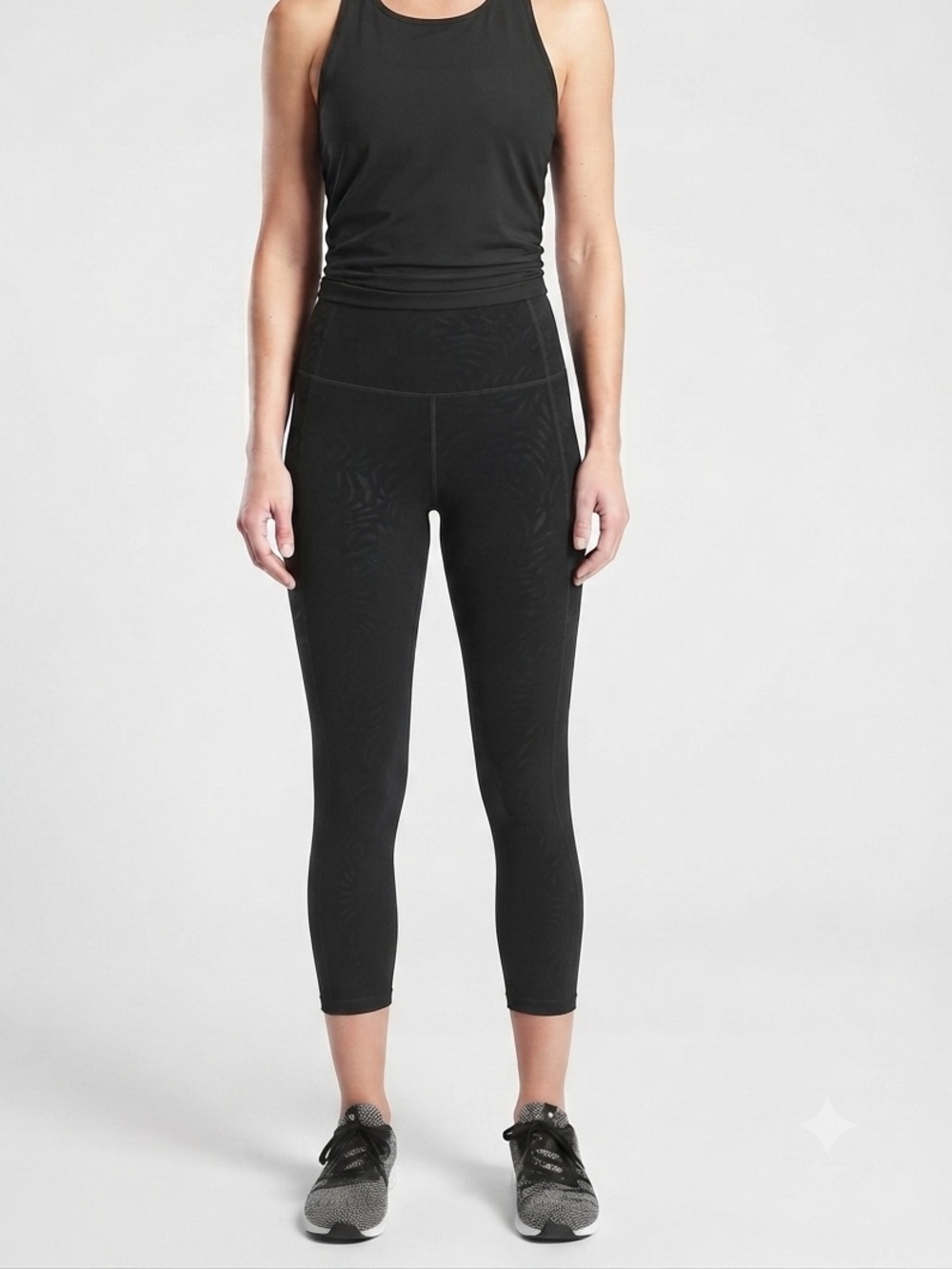Athleta Ultimate Stash Pocket Black Capri Leggings XXS Embossed Animal Print